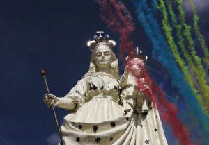 Fireworks are seen at the inauguration of the statue of the Virgin of the Socavon, the patron saint of miners, at Santa Barbara hill on the outskirts of Oruro